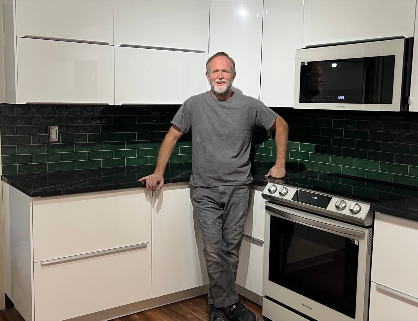 Bradley Jay standing in a remodeled kitchen